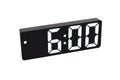 Digital alarm clock isolated on white. Black slim clock with white digits.