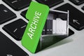 Digital archive. Rack with folders under open green button on computer keyboard Royalty Free Stock Photo