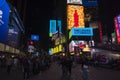Digital billboards lighting up night Broadway, Manhattan, New York.