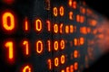 Digital binary code display with glowing red and orange circuit patterns Royalty Free Stock Photo