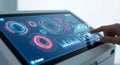 Digital Blood Analysis Machine Interface with Touch Input Displaying Medical Data and Graphs in Blue, Red, and White in a Royalty Free Stock Photo