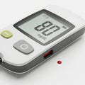Digital blood glucose meter with test strip Royalty Free Stock Photo