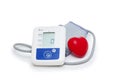 Digital blood pressure meter with love heart symbol on white background Royalty Free Stock Photo