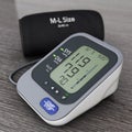 Digital Blood Pressure Monitor with Cuff. 3d Rendering Royalty Free Stock Photo