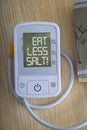 Digital blood pressure monitor with message Royalty Free Stock Photo