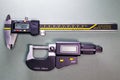 Digital caliper and a digital micrometer Royalty Free Stock Photo