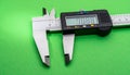 Digital Caliper for Precision Measurement on Green Screen Royalty Free Stock Photo