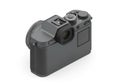 Digital camera with a black matte finish. It features a prominent electronic viewfinder, Royalty Free Stock Photo