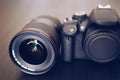 Digital camera or DSLR with camera lens with lense reflections. Royalty Free Stock Photo