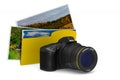 Digital camera and folder on white background. Isolated 3D illus Royalty Free Stock Photo