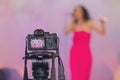 Digital camera that stands on a tripod when shooting a wedding celebration Royalty Free Stock Photo