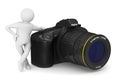 digital camera on white background and man. Isolated 3D illustration Royalty Free Stock Photo