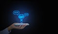 Digital chatbot, conversational agents, robot application, conversation assistant that mimic human speech. Hand holding smartphone