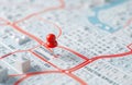 Digital city map shows location with red pin. Interactive navigation tech highlights place. Urban planning visible. Modern tech