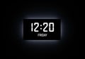 Digital clock against a dark background Royalty Free Stock Photo