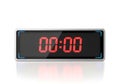 Digital clock displaying zero time with bright red numerals on a white background Royalty Free Stock Photo