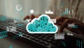 Digital Cloud Computing Concept with Data Visualization and Analytics on Keyboard, Representing Cloud Technology and Royalty Free Stock Photo