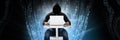 Anonymous hacker with computer code binary interface Royalty Free Stock Photo