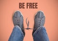 Be free text and Grey shoes on feet with pink background