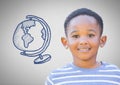 Boy against grey background smiling and world globe