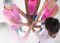 Breast cancer awareness women putting hands together Royalty Free Stock Photo