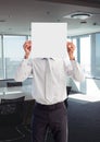 Business man holding blank card in office Royalty Free Stock Photo