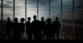 Business people silhouettes against building Royalty Free Stock Photo