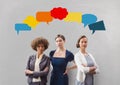 Business women with speech bubble against grey background Royalty Free Stock Photo