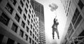 Businessman floating with balloons over surreal city buildings perspective