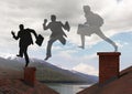 Businessman silhouettes with briefcase jumping on Roofs with chimney and mountain lake landscape Royalty Free Stock Photo