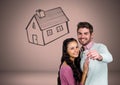 Couple Holding key with house drawing in front of vignette Royalty Free Stock Photo