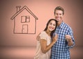 Couple Holding key with house drawing in front of vignette Royalty Free Stock Photo