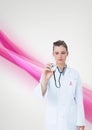 Doctor woman with breast cancer awareness ribbon Royalty Free Stock Photo