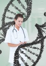 Doctor woman standing with 3D DNA strand Royalty Free Stock Photo