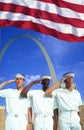 Digital composite: Ethnically diverse American sailors, American flag, St. Louis Arch