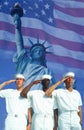 Digital composite: Ethnically diverse American sailors, American flag, Statue of Liberty