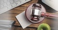 Gavel and keyboard on desk Royalty Free Stock Photo