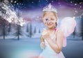 Girl with fairy princess costume and frozen winter forest Royalty Free Stock Photo