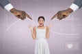 Hands pointing at surprised business woman against pink background with electrocardiogram Royalty Free Stock Photo