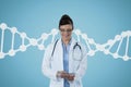 Happy doctor woman looking down with DNA strand Royalty Free Stock Photo