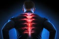 Digital composite of highlighted spine of man with back pain against blue background, highlighted Lower back pain showing with red