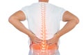 Digital composite of highlighted spine of man with back pain