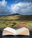 Digital composite image of Beautiful landscape of Brecon Beacons National Park with moody sky in pages of imaginary open reading