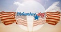 Digital composite image of columbus day symbol with star over american flag and sky