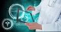 Digital composite image of doctor using digital tablet by medical icons Royalty Free Stock Photo