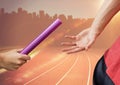 Digital composite image of hands passing the baton Royalty Free Stock Photo