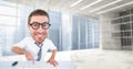 Digital composite image of happy nerd using computer keyboard Royalty Free Stock Photo