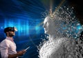 Digital composite image of man using digital tablet and VR glasses by 3d human Royalty Free Stock Photo