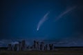 Digital composite image of Neowise Comet over Stonehenge in England
