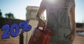 Digital composite image of 20 percent discount sign by woman carrying petrol gallon at station